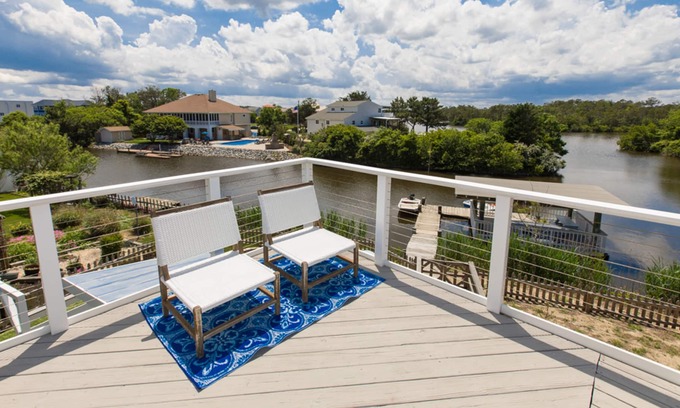 Sandbridge House | Designer beach house with incomparable bay views, foosball table, dock, AC