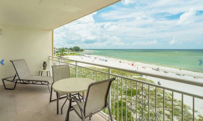 Madeira Beach Condo | DIRECT BEACHFRONT CONDO Pool, Beautifully Renovated 2 Bedroom 4th Floor Balcony.
