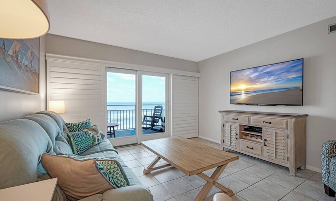 New Smyrna Beach Condo | Direct oceanfront condo with private balcony, heated beachfront pool, and beach access