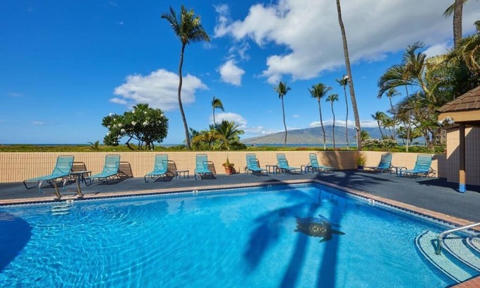 Kihei Condo | Direct oceanfront steps from the beach, pool, bbqs and sunsets.!