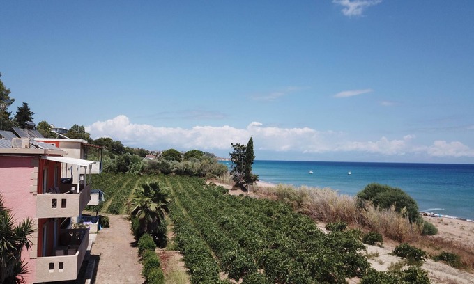 Pylos-Nestoras Apartment | Directly on the fine Memi sandy beach located apartment with sea view.
