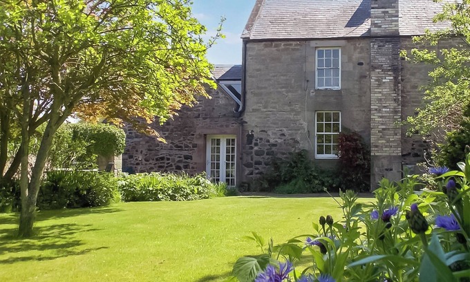 Waren Mill Cottage | Discover coastal tranquility in Millhouse Cottage on Budle Bay.