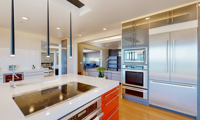 Loyola House | Dog-friendly bay-view home with deck, private saltwater pool, fireplaces, grill