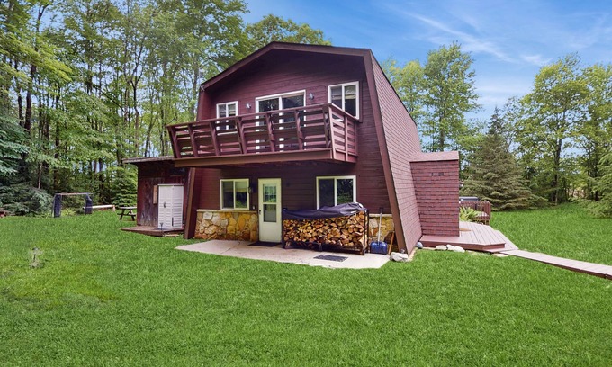 Accident House | Dog-friendly cabin with firepit, deck, private hot tub, fireplace