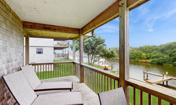 Brigands' Bay House | Dog-friendly, canal-front house with dock, balcony, deck, & central AC