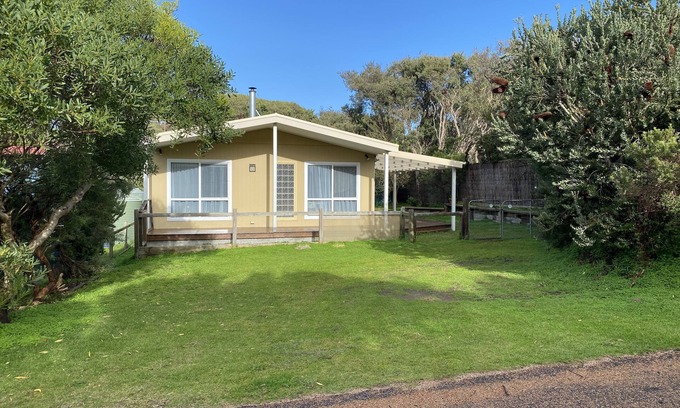 Sandy Point House | Dog friendly close to beach/shops, trampoline, hot outside shower, NBN Wifi