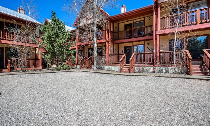 Red River Condo | Dog-friendly, creekside condo with hot tubs, fast WiFi, washer/dryer, fireplace