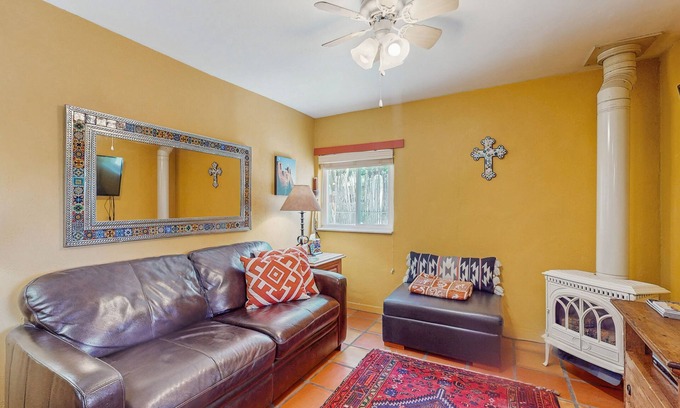 Taos House | Dog-friendly getaway with a gas fireplace, full kitchen, & patio