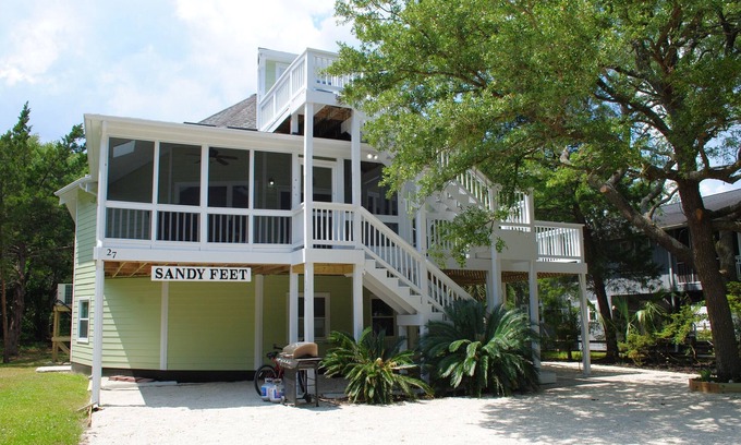 North Litchfield Beach House | Dog friendly* home with screened porch located second row at North Litchfield Beach.
