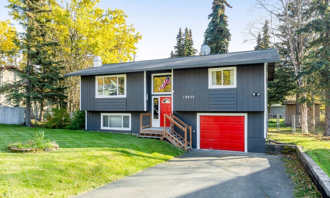 Eagle River House | Dog-friendly home with a fenced yard, putting green, & shared washer/dryer