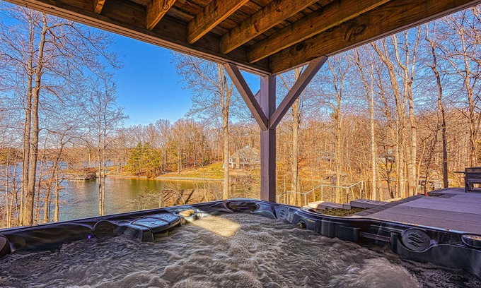 Huddleston House | Dog-friendly lakefront home with hot tub, dock, kayaks, & game room