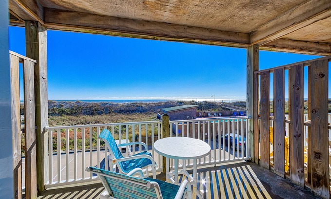 Hatteras Condo | Dog-friendly oceanfront condo with balcony, outdoor pool, hot tub, and central AC