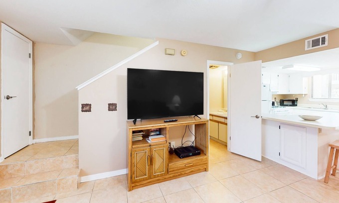 Panama City Beach House | Dog-friendly townhouse with patio, W/D, hot tub, heated pool, gym, & tennis