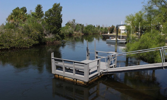 Port Richey House | Dolphin Cove Getaway - 3 bedroom waterfront, floating dock, with water "toys"!