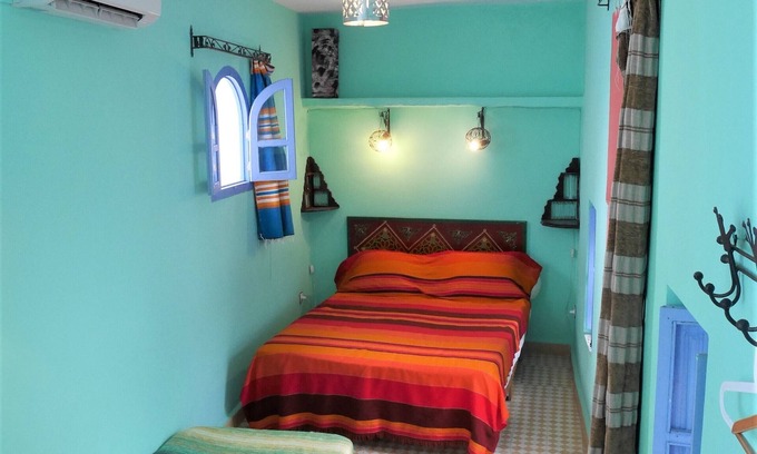 Medina of Chefchaouen Bed & Breakfast | double bedroom with bathroom and private terrace. breakfast included