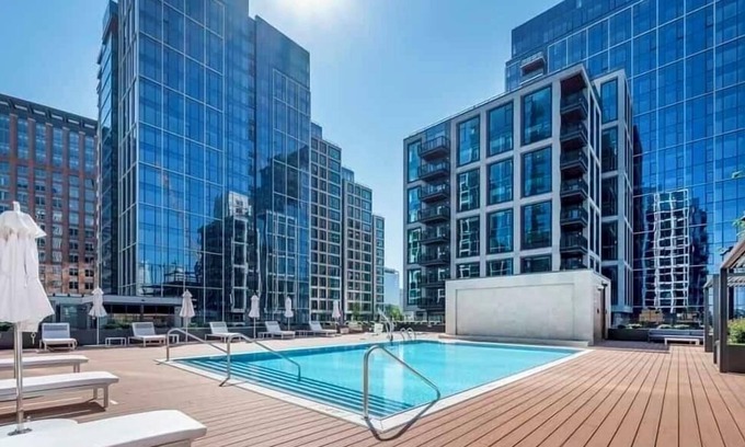 East Cambridge Apartment | Downtown Boston Designer space with Gym and rooftop Oasis’s ,Walk to Seaport!