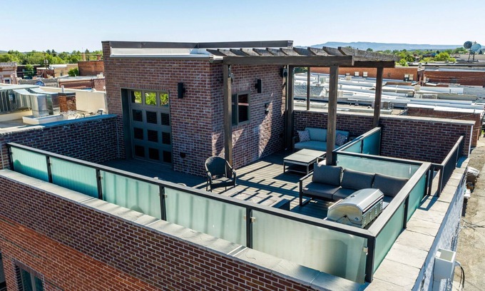 Cody House | Downtown Loft- industrial modern loft-style penthouse with rooftop deck!