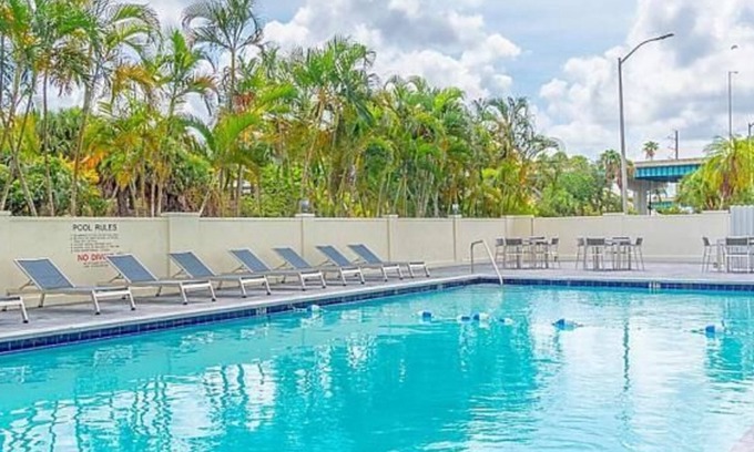 Miami Springs Hotel | Dream Family Vacation! 2 Classy Units, Pool, Fitness Center, Near Marlins Park!
