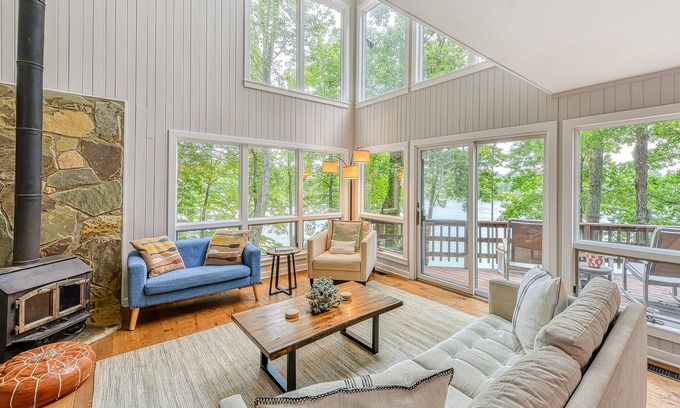 Livingston House | Dreamy lakefront gem on wooded property with private beach, dock & fast WiFi