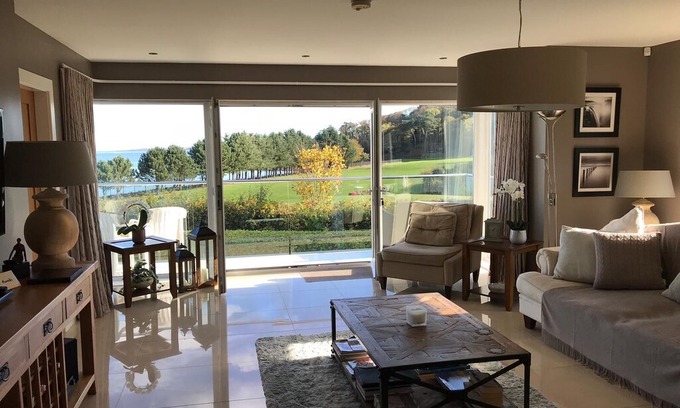 Helen's Bay Apartment | Driftwood - Luxury Beach Apartment Overlooking Golf Course and Sea