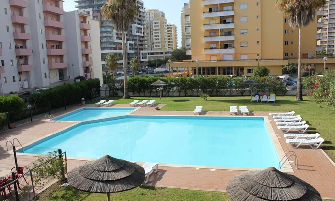 Praia da Rocha Apartment | Duplex apartment with terrace overlooking swimming pool 200m from the beach