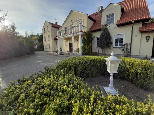 Orlinki Bed & Breakfast | Dworek Bursztynowe Piaski