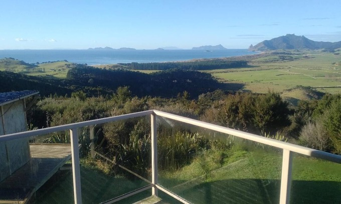 Taiharuru House | Eagles Rest: Unwind, Relax with Nature & Breathtaking Ocean and Mountain Views