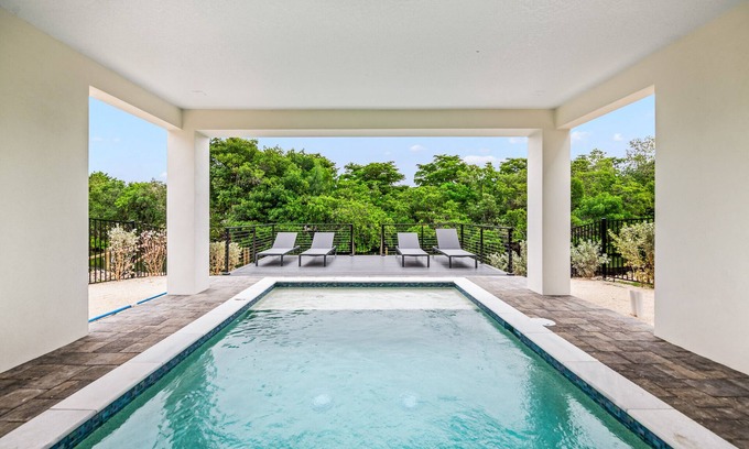 Cortez House | Eco-Luxury Canalfront Home with Pool and Dock near Anna Maria Island