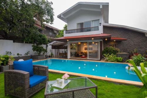 Kune N.m. Villa | EL Lodge by StayVista - Pool, lawn, and a charming gazebo for your perfect getaway