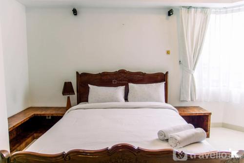 Semanggi Apartment | Elegant 2BR with Extra Room Apartment at Sudirman Tower Condominium By Travelio
