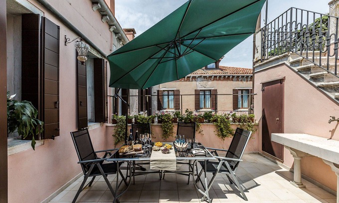 Castello Apartment | Elegant 6 Bedroom Penthouse with Terrace and Canal View
