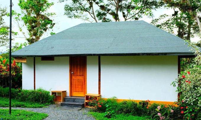 Puerto Quito Cabin | Elegant and beautifully crafted cabin with fine wood. Cozy by nature and birds.