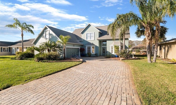 Palm Harbor House | Elegant Canal Home with Heated Pool