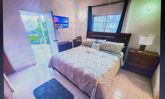 Tower Isle House | Elegant Estate Home nOcean/view . balconies nGarden/pool view nlush greenery nn
