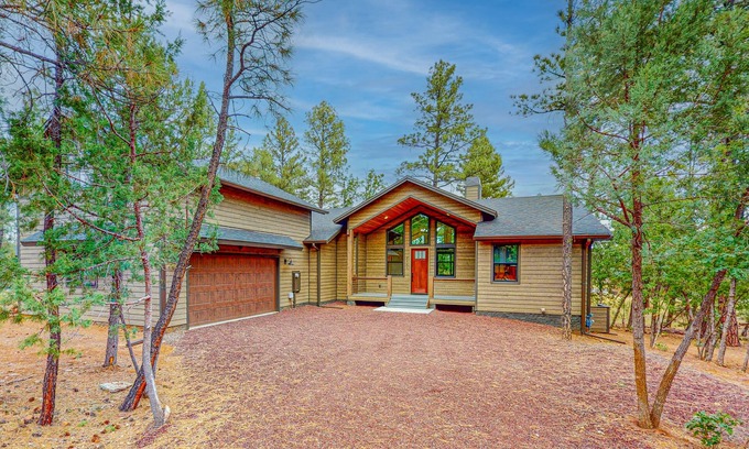 Torreon House | Elegant home with expansive patio and fireplace with golf nearby