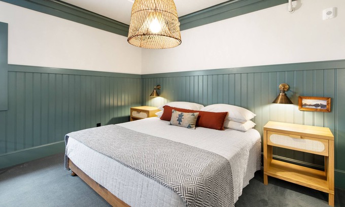 Poulsbo Apartment | Elegant room at Historic Hotel Scandi with sofabed, kitchenette, & city views