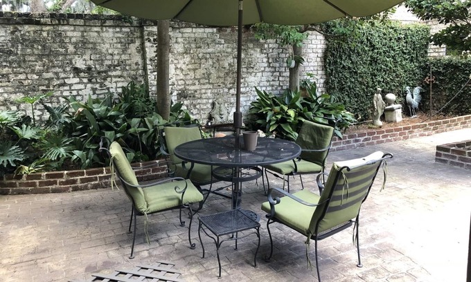 Historic Downtown Savannah Apartment | Elegant Savannah Patio Apartment! An Arty Flair on Jones Street