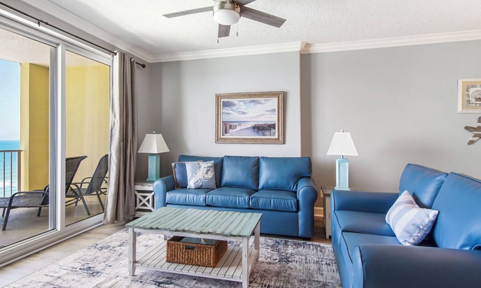 West Panama City Beach Condo | Emerald Isle 1306 - Front row beach chair service included! Affordable rates!