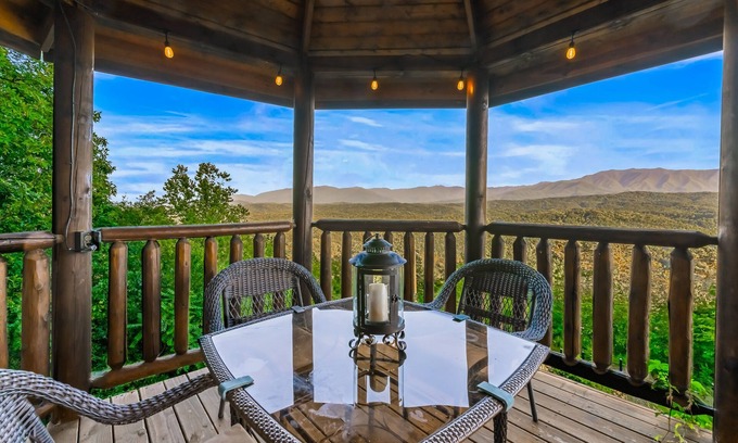 Gatlinburg - Pigeon Forge Cabin | Enchanting cabin retreat w/hot tub & amazing deck views +free attraction tickets