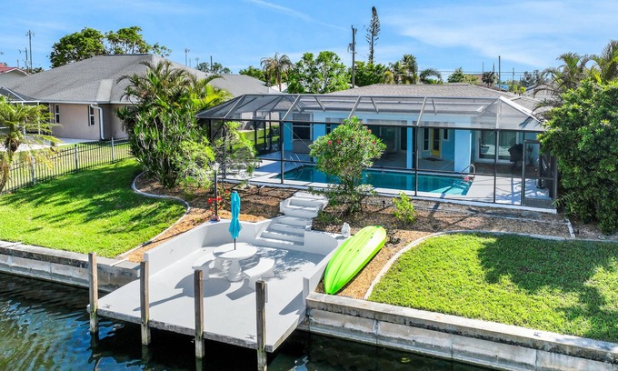 Fort Myers House | Enchanting waterfront home with pool, dock, washer/dryer, & dog-friendly