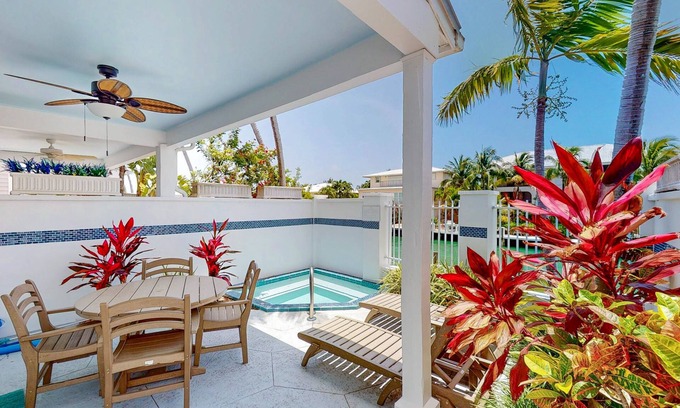 Marathon House | Enchanting waterfront townhouse with balcony, plunge pool, & washer/dryer