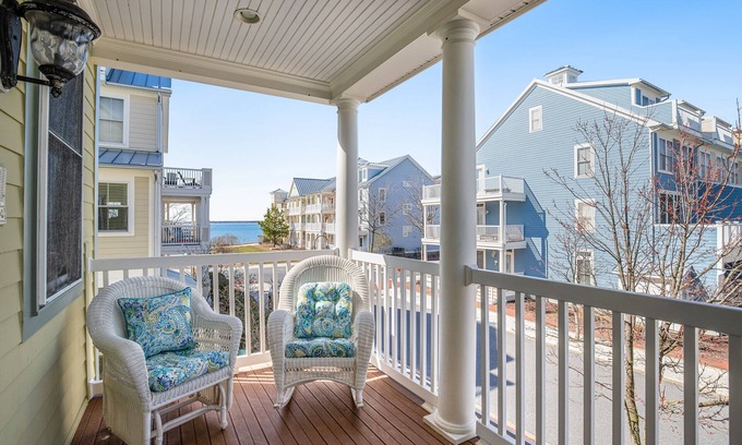 Sunset Island House | End townhome w/partial bay view - steps to resort pools, beach & clubhouse