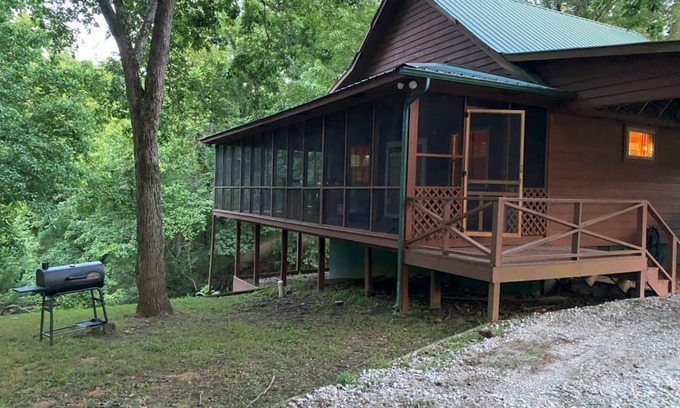 Pleasant Grove Cabin | Enjoy a warm fire! Fish in the lake or river, relax in the Outhouse Lounge