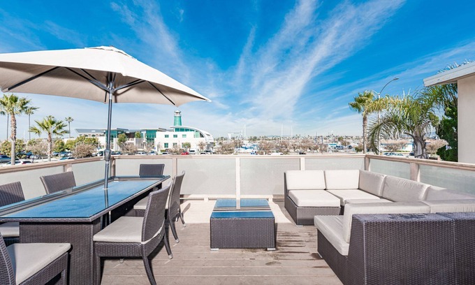 Balboa Peninsula Condo | Enjoy Amazing Views of the Harbor, From the Coolest Patio in Town!