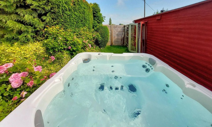 Le Ponthou House | Enjoy an unforgettable time in this idyllically located vacation home with outdoor hot tub.