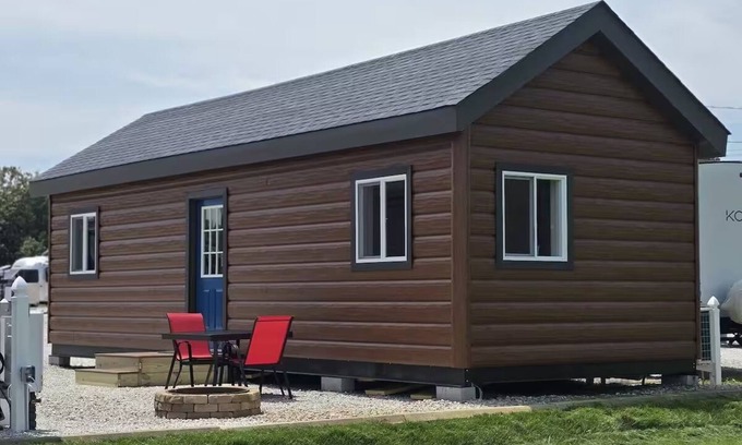 Tuscumbia Cabin | Enjoy cabin #65 at Heritage Acres Park with swimming, splash pad & more!
