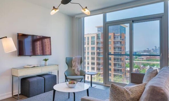 Near North Side House | Enjoy city views in our studio with one queen bed, furnished kitchen and a deluxe bathroom.