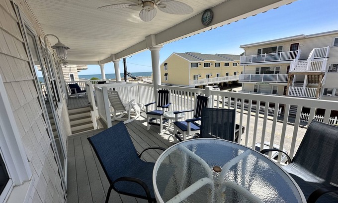 Midtown Ocean City Condo | Enjoy Ocean views from your top unit furnished porch Free linens
