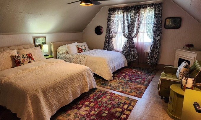 Lansing House | Enjoy the top floor of this victorian house nWith two suites & a bonus bedroom