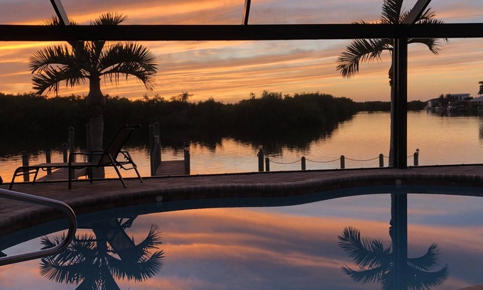 Pelican House | Enjoy the view to the nature reserve from your private pool & spa at Villa Amara